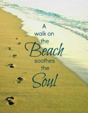 in the sand as she walks along the beach canvas