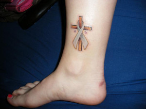 Cross And Ribbon Cancer Tattoo On Leg