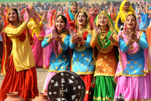Indian youth perform a Punjabi traditional folk dance, the Giddha ...