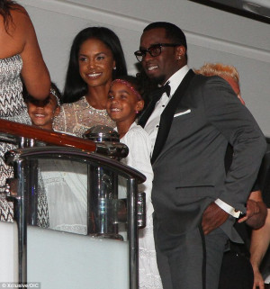 Diddy with twins and their mum Kim Porter