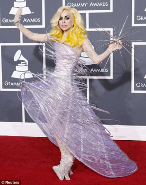 Outrageous: Lady Gaga poses on the red carpet at the 52nd annual ...