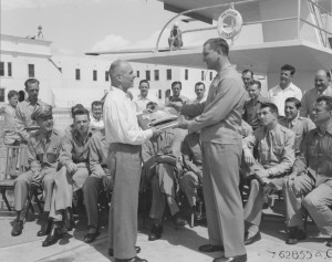 Lieutenant General James Doolittle being presented a plaque containing ...
