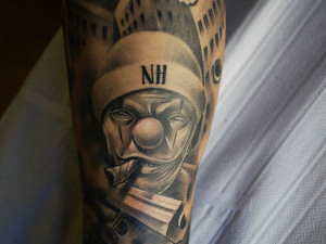 ... sketch style gives an arty look to the clown, in this gangsta tattoo