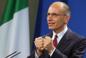 New Italian Prime Minister Enrico Letta speaks to the media with ...