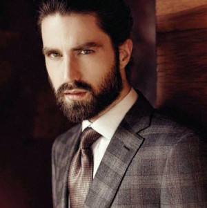Attractive bearded men wearing suits