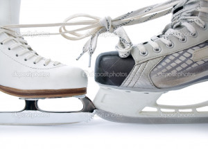 Ice skates tied against each other - Stock Image