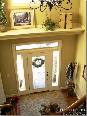 Good idea… add a shelf to split up your large two story foyer!