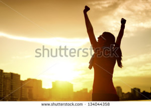 raising arms to the sky on golden back lighting sunset summer. Fitness ...