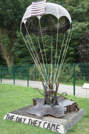 Above): Monuments to the 101st and 82nd Airborne in St. Mere-Eglise.