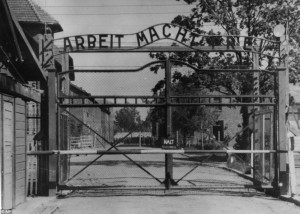 image shows the main gate of the Nazi concentration camp Auschwitz ...