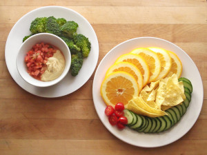 broccoli, cucumber slices, grape tomatoes, and tortilla chips with ...
