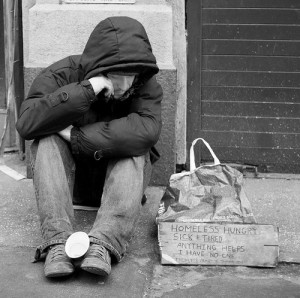 Black and White Photo of Homeless Man