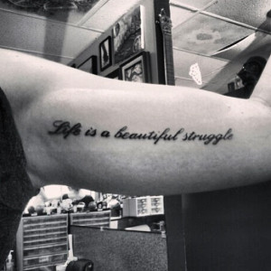 Love Is a Beautiful Struggle Bicep Tattoo For Girls