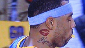 Kenyon Martin tattoo lips on neck
