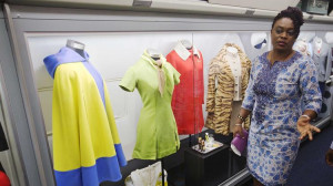 and first ceo c e woolman the display includes a portrait of woolman ...