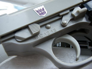 One side of the Megatron gun should say 