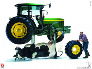 Swiss Milk Ad | Cow Holding Up A John Deere Tractor While Farmer ...