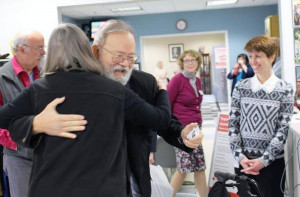 Michael Zapata of Cary hugs Red Cross team supervisor Mary Spradlin at