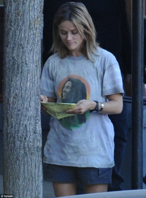 Reese was spotted reading up on her lines intently when she had a ...