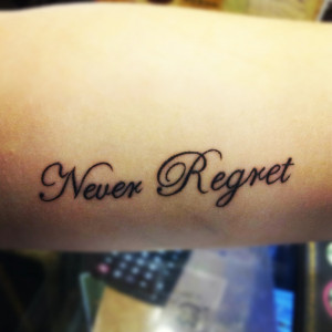 and yeah! i done my 1st tattoo on my hand.. written as never regret