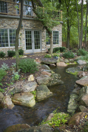 Natural looking, winding stream in Northwest Indiana. Backyard Stream