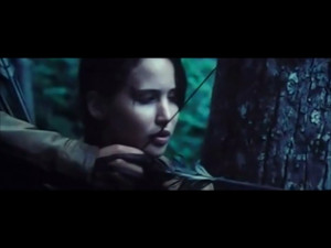 Katniss brings the arrow to her anchor point