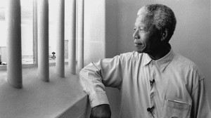 Nelson Mandela revisits his prison cell on Robben Island in 1994 ...