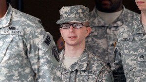 PHOTO: Army Pfc. Bradley Manning, center, is escorted out of a ...