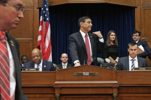 Darrell Issa (R-CA) (C) orders ranking member U.S.Rep. Elijah Cummings ...