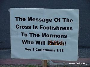 An anti-Mormon protester claims—falsely—that Latter-day Saints do ...