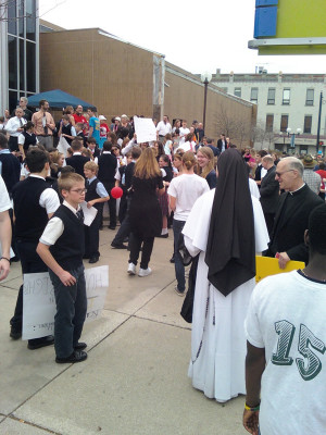 annarborchronicle.comSome people wearing T-shirts