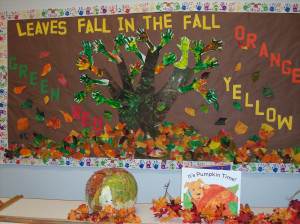 ... painted leaves and arm and hand print branches made up our fall tree