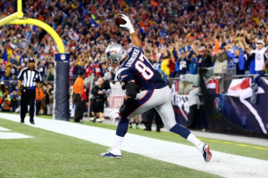 completed 25 of 32 passes for 288 yards and four scores. Gronkowski ...