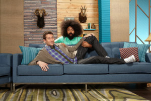 Aukerman (on the couch) with co-star Reggie Watts. Photo courtesy of ...