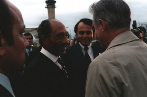 ... Anwar Sadat of Egypt is welcomed by Secretary of State Cyrus Vance