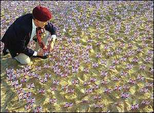 ... Union Jack flag in the sand on Sword Beach in Hermanville, Normandy