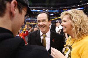 Wichita State coach Gregg Marshall signs autographs for fans after