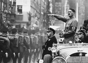 Adolf Hitler salutes SS troops on parade in Nuremberg whileSS Leader ...