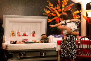 family’s grief, A nation’s loss. A father salutes the casket of ...