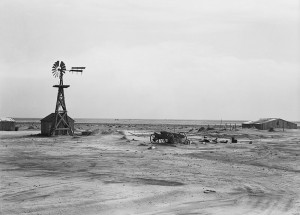 Abandoned farm with windmill and farm equipment. Dalhart, Texas. June ...