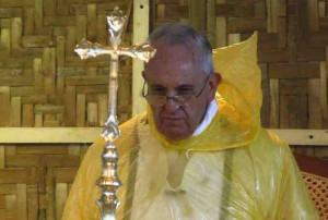 Pope Francis held a mass at Tacloban airport wearing a transparent ...