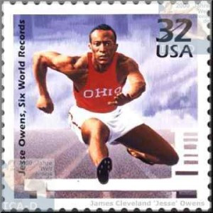 ... Jesse Owens competing in a hurdles event at Ohio State University