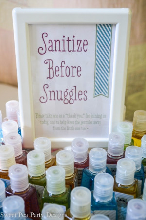 ... favors, with a sign reading, “Sanitize Before Snuggles.” Cute