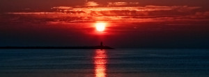 Red Sunset Over Lighthouse Facebook Cover Preview