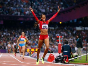 Sanya Richards-Ross celebrates after anchoring the US gold-winning ...