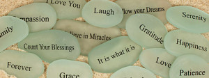 Tumbled sea glass engraved with inspirational words and quotes.