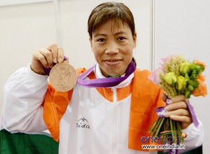 mary-kom-with-bronze-medal_13446674593