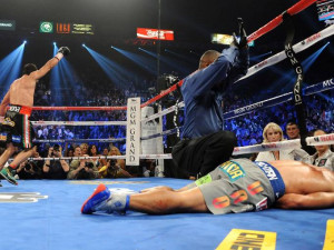 Pacquiao knocked out by Juan Manuel Marquez