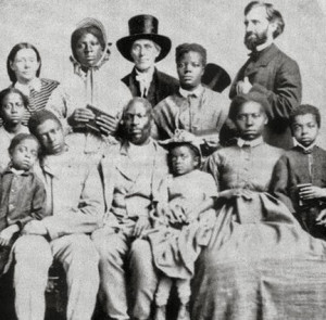 The Quaker standing in the back row is thought to be Levi Coffin