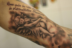 Tattoos.so » Cherub with Latin Quote Tattoo on Upper Arm